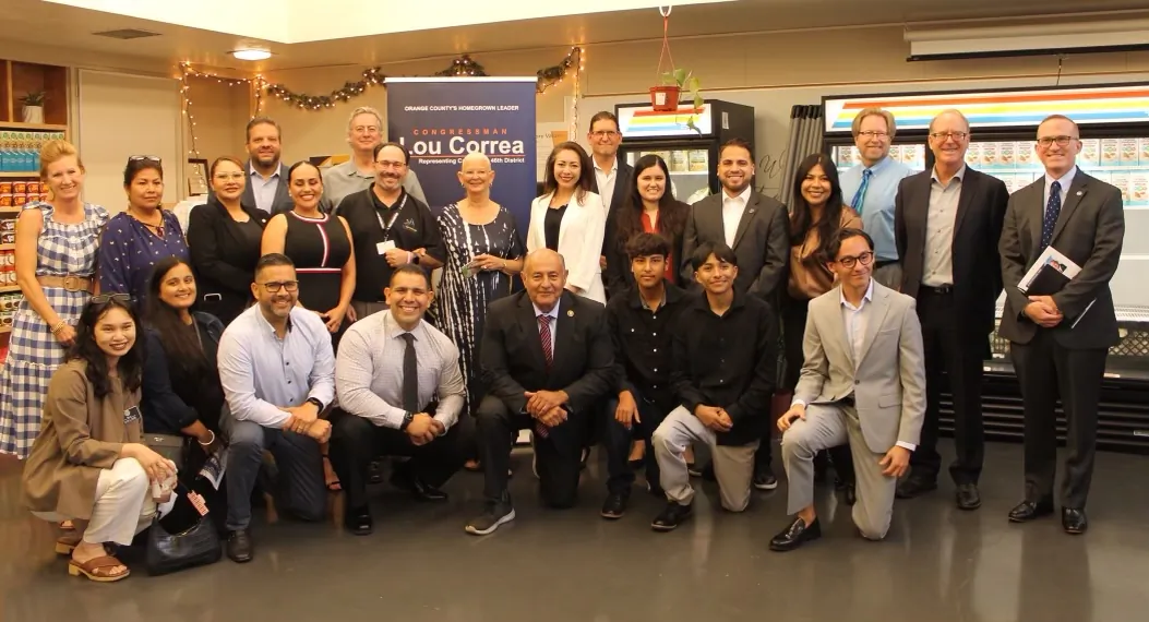 U.S. Rep. Lou Correa (D-Calif.) (front, 5th L) poses for a photo with local leaders and residents following the farm bill reauthorization roundtable discussion in Anaheim, Calif., on July 6, 2023. (Carol Cassis/The Epoch Times)