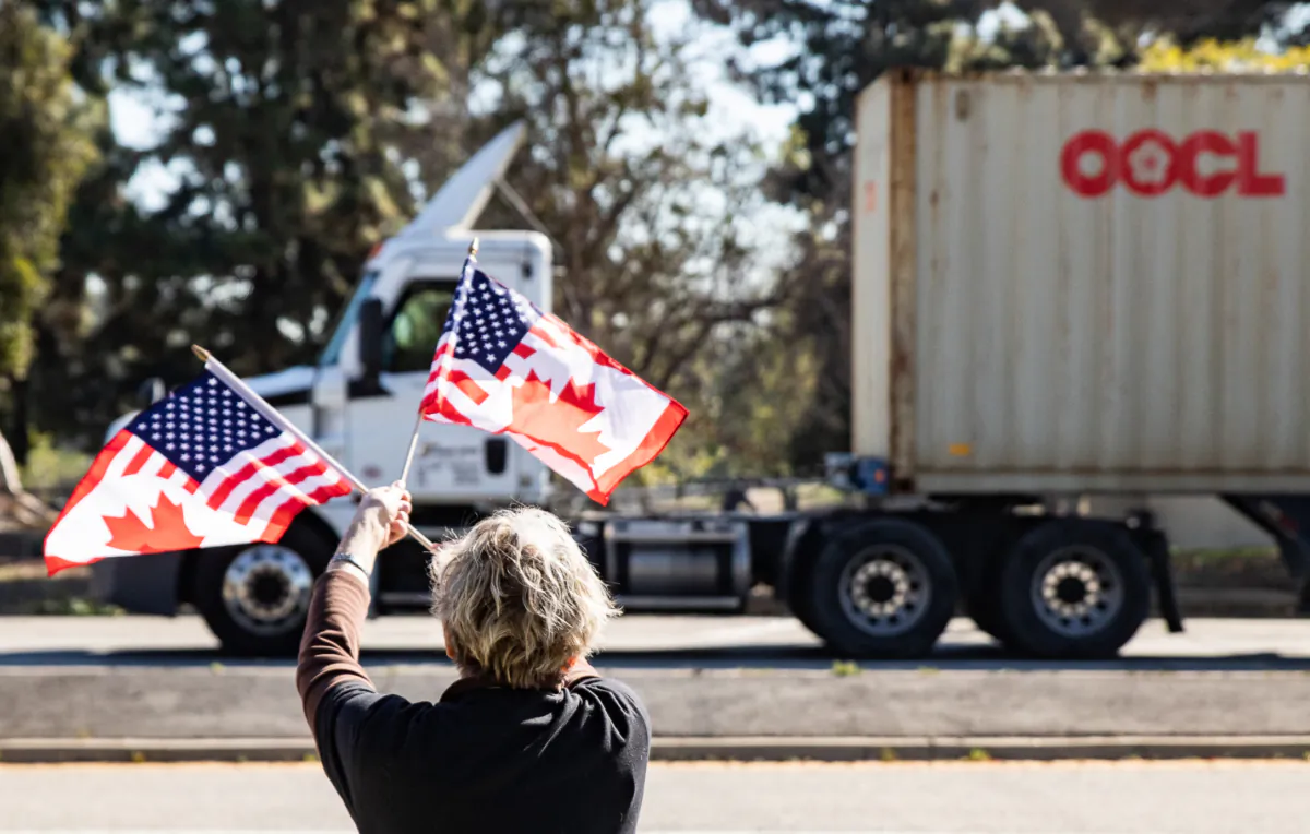 People gather in El Monte, Calif., to show support for truckers taking part in a convoy from Los Angeles to Washington in protest of COVID-19 mandates on Feb. 25, 2022. (John Fredricks/The Epoch Times)