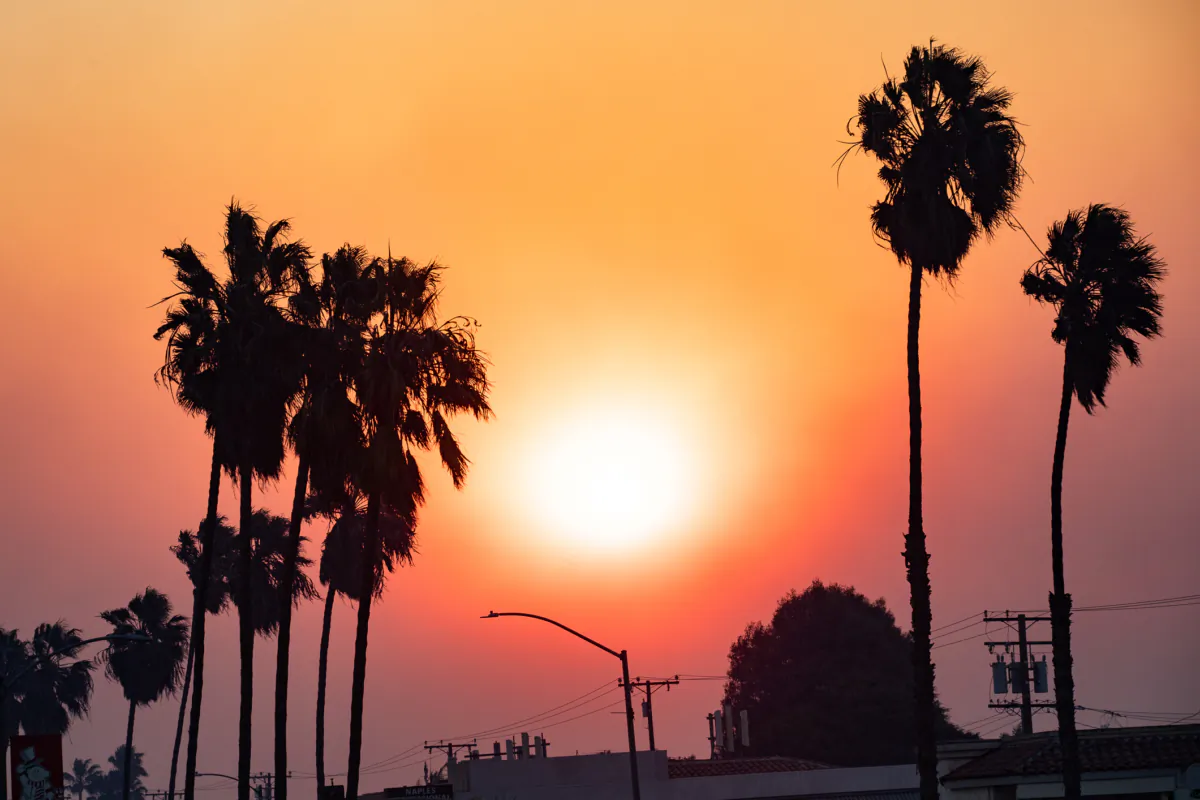 A hazy sunset amid the Silverado Fire in Long Beach, Calif., on Dec. 3, 2020. (John Fredricks/The Epoch Times)