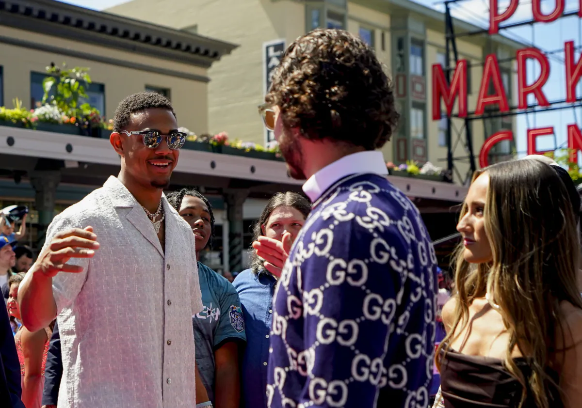 Seattle Mariners' Julio Rodriguez greets Arizona Diamondbacks pitcher Zac Gallen during the baseball All-Star Game red carpet show in Seattle on July 11, 2023. (Lindsey Wasson/AP Photo)