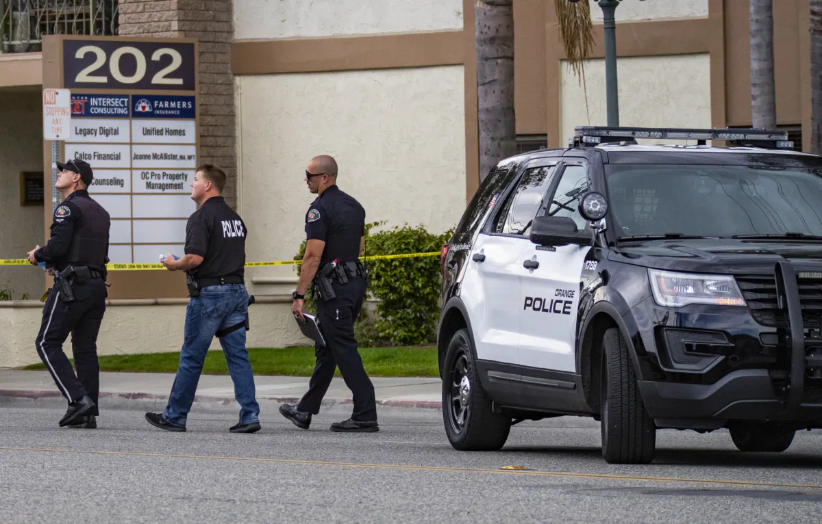 Police moniter a crime scene in Orange, Calif., on April 1, 2021. (John Fredricks/The Epoch Times)
