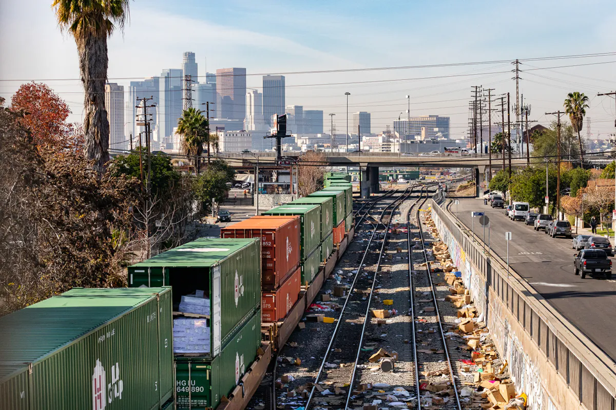Cardboard boxes strewn across railroad tracks in Los Angeles on Jan. 14, 2022. (John Fredricks/The Epoch Times)