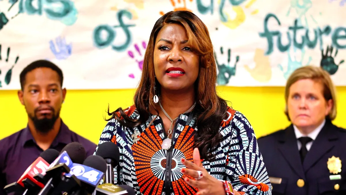 St. Louis Mayor Tishaura Jones, center, speaks during a news conference at the Wohl Recreation Center in St. Louis, Missouri, on June 18, 2023. (David Carson/St. Louis Post-Dispatch via AP)