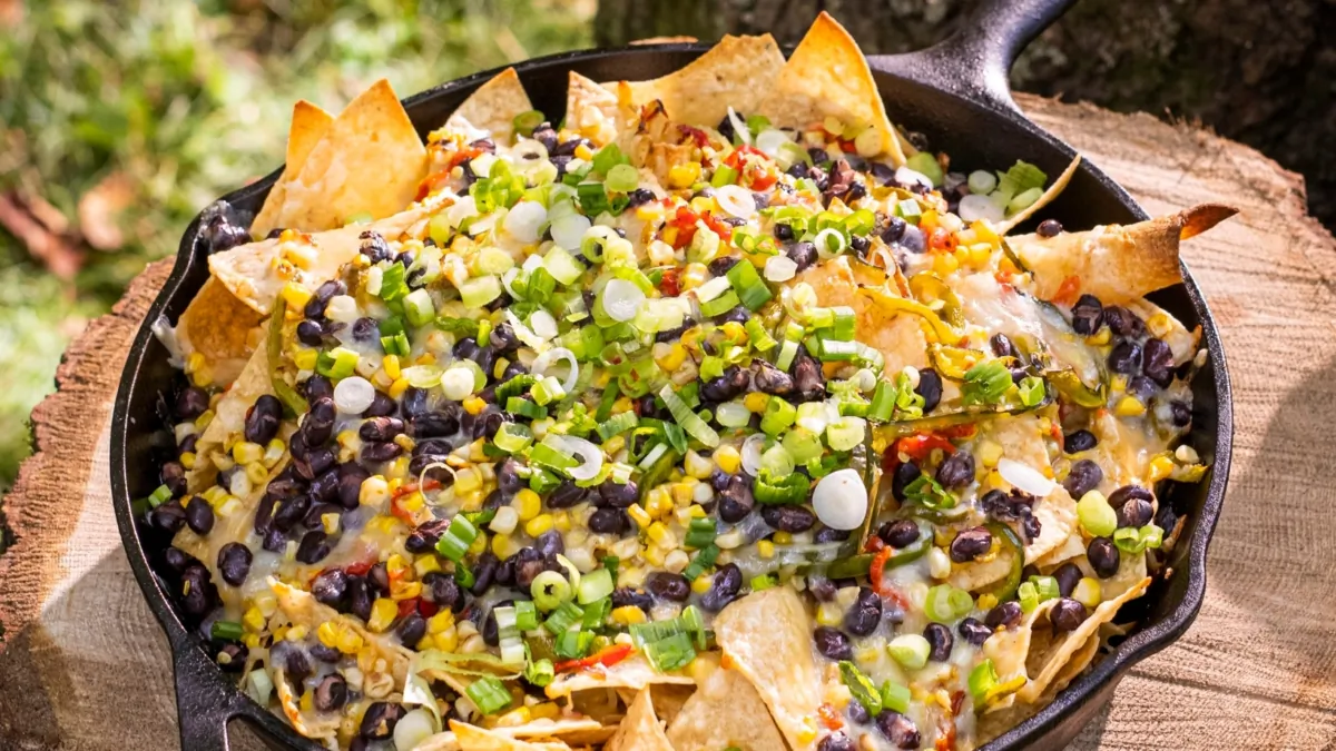 The key to creating delicious nachos is layering. (Joseph Keller/TNS)