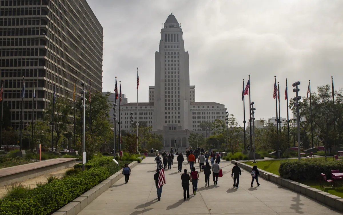 People walk toward Los Angeles City Hall on Nov. 8, 2021. (John Fredricks/The Epoch Times)