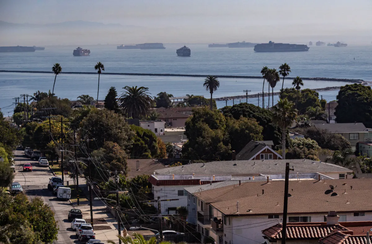 Ships wait to enter the ports of Los Angeles and Long Beach on Oct. 14, 2021, a month before the United States' largest port was overwhelmed with cargo it could not unload and get out of the port for weeks.(John Fredricks/The Epoch Times)
