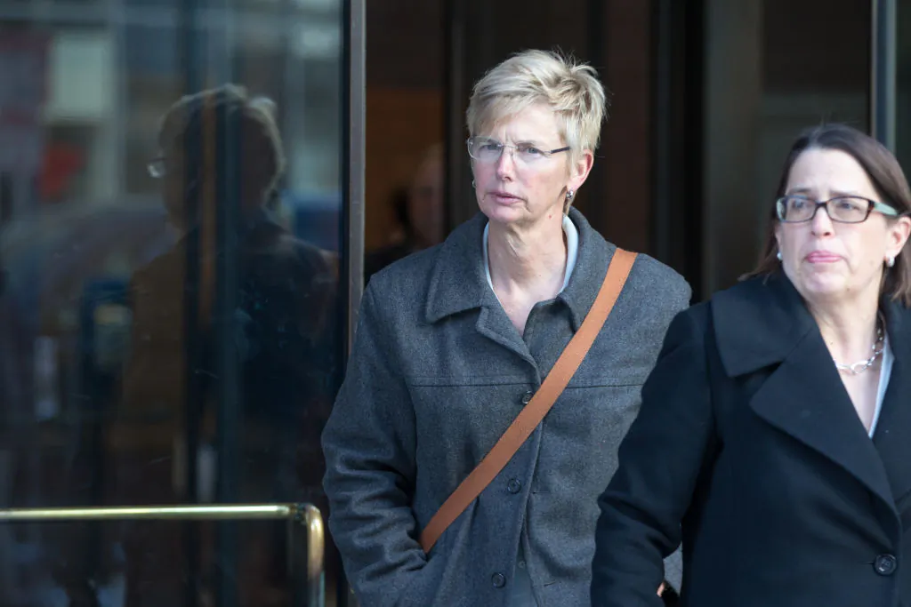 Donna Heinel, former senior associate athletic director at the University of Southern California, leaves following her arraignment at Boston Federal Court in Boston, on March 25, 2019. (Scott Eisen/Getty Images)