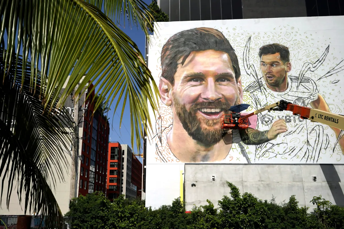 Artist Maximiliano Bagnasco paints a mural of Argentine soccer star Lionel Messi, in the Wynwood neighborhood of Miami on July 10, 2023. (Lynne Sladky/AP Photo)