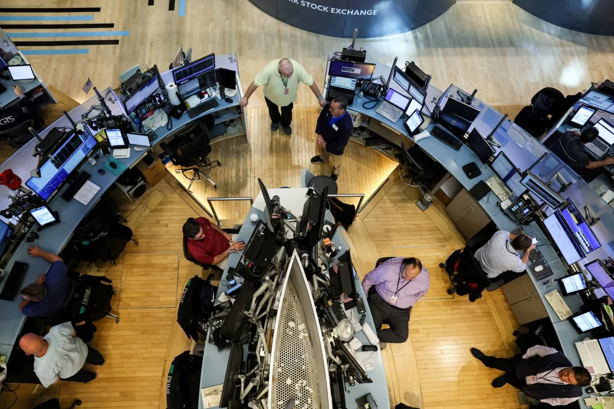 Traders work on the floor of the New York Stock Exchange (NYSE) in New York City on July 7, 2023. (Brendan McDermid/Reuters)
