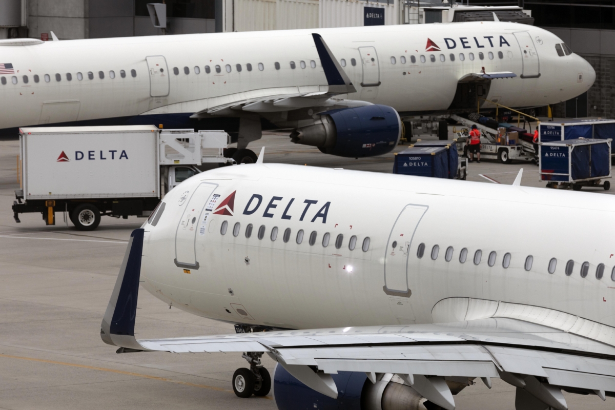 NextImg:Delta Air Lines Is Soaring to a Record $1.8 Billion Profit as Summer Vacationers Pack Planes