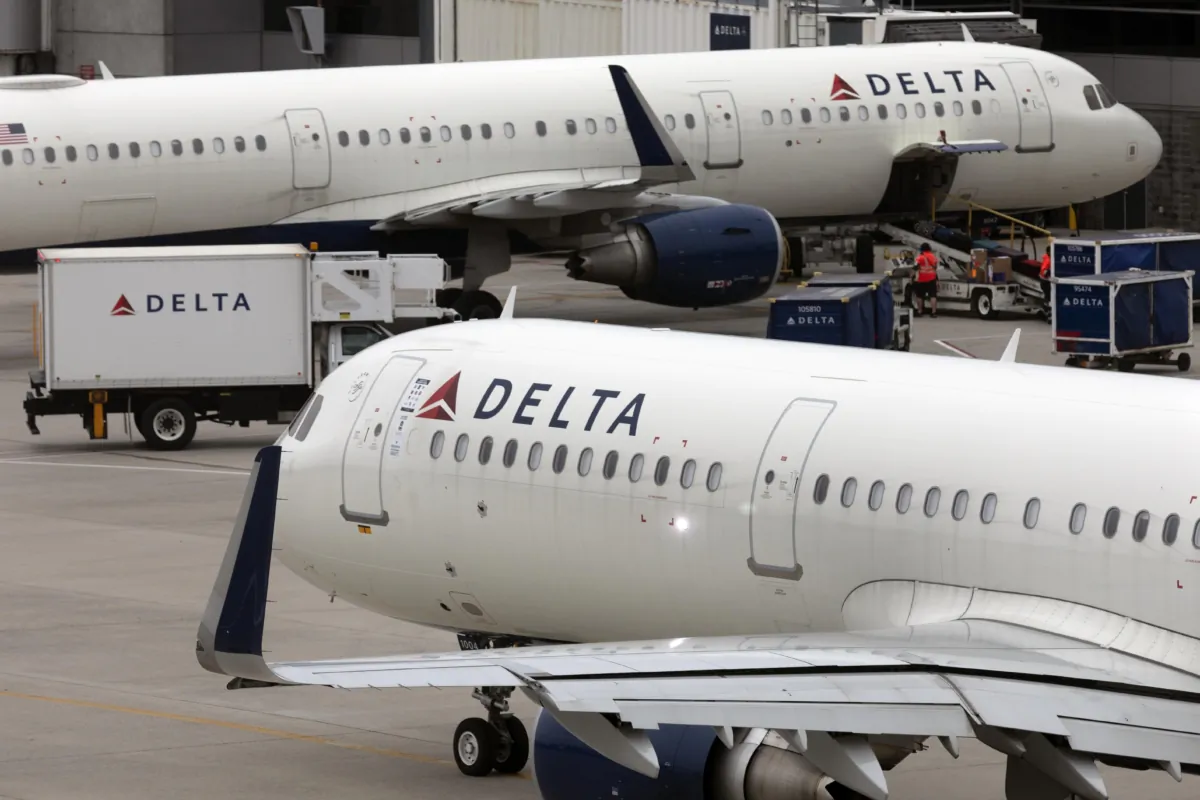 A Delta Airlines plane leaves the gate at Logan International Airport in Boston on July 12, 2021. (Michael Dwyer/AP Photo)