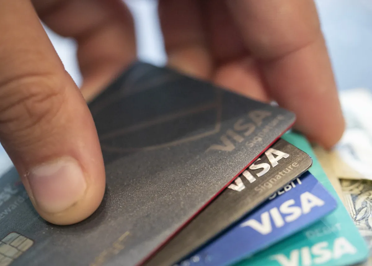 So-called alternative credit cards from financial technology companies can offer you the opportunity to build credit when your options are limited, and they tend to lower or eliminate many barriers along that path. But they aren’t without their potential drawbacks. (AP Photo/Jenny Kane, File)