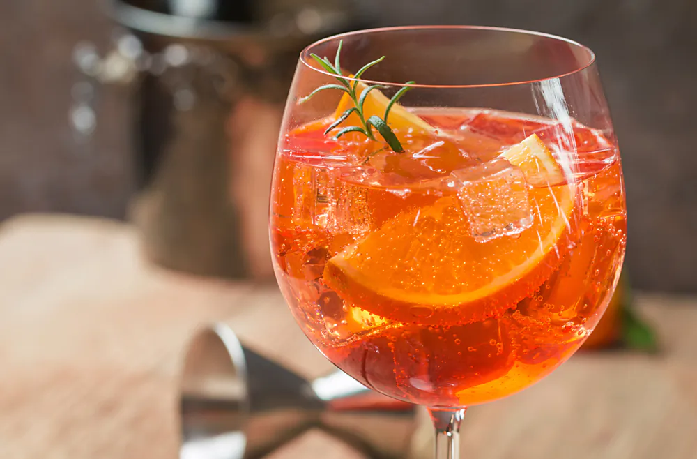 With its unmistakable bright-orange hue, the Aperol spritz remains a summertime icon. (Goskova Tatiana/Shutterstock)