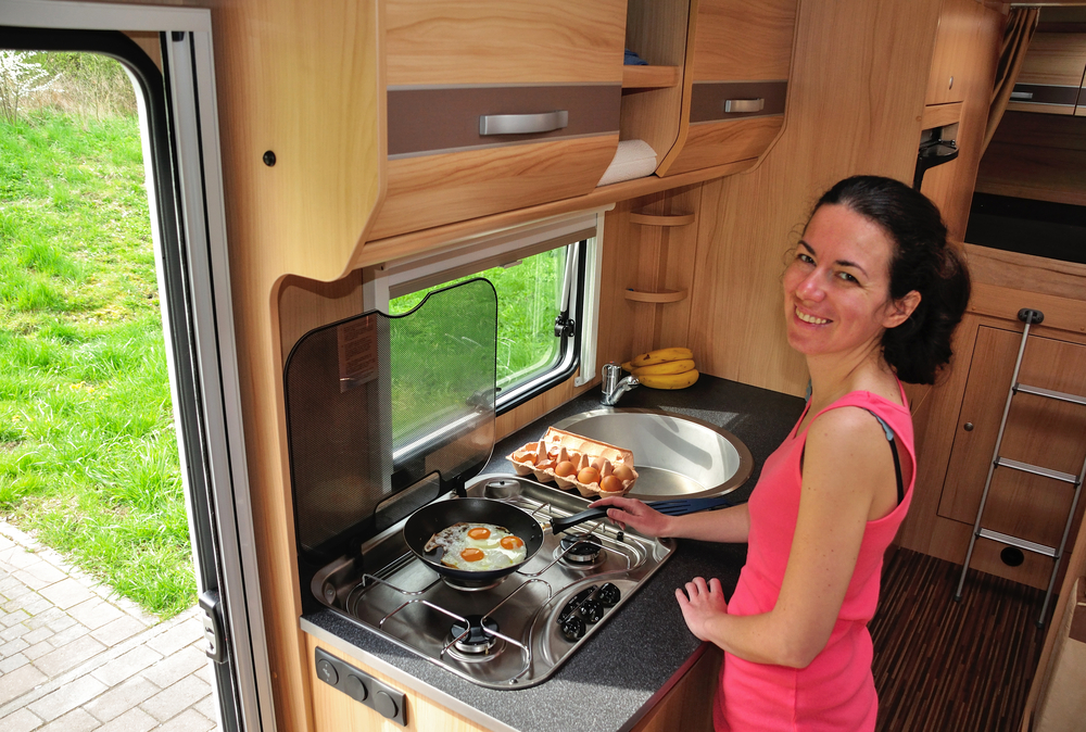 Family Vacation Rv Holiday Trip Camping Happy Smiling Woman Cooking