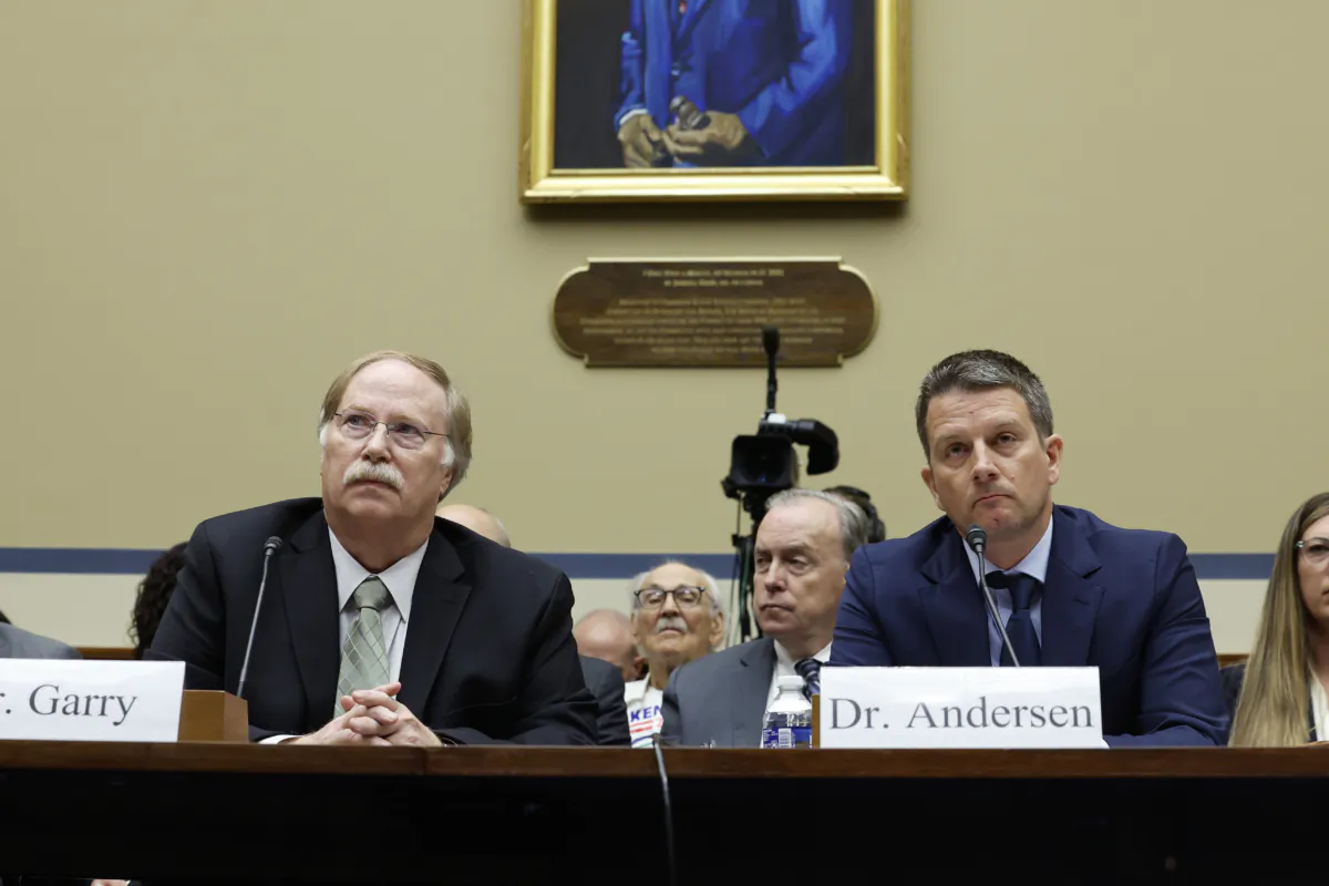Dr. Robert Garry, a professor at Tulane University School of Medicine, and Dr. Kristian Andersen Scripps Research listen during a hearing with the Select Subcommittee on the Coronavirus Pandemic on Capitol Hill in Washington on July 11, 2023. (Anna Moneymaker/Getty Images)