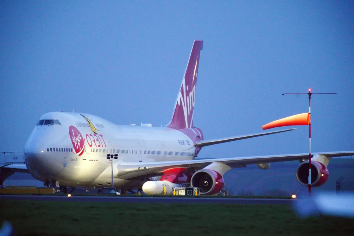 A repurposed Virgin Atlantic Boeing 747 aircraft carrying Virgin Orbit's LauncherOne rocket, on Jan. 9, 2023. (Ben Birchall/PA Media)