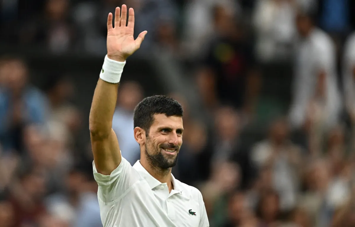 Serbia's Novak Djokovic celebrates winning his semi final match against Italy's Jannik Sinner during the 2023 Wimbledon Championships at The All England Lawn Tennis and Croquet Club, in London, Britain, on July 14, 2023. (Dylan Martinez/Reuters)