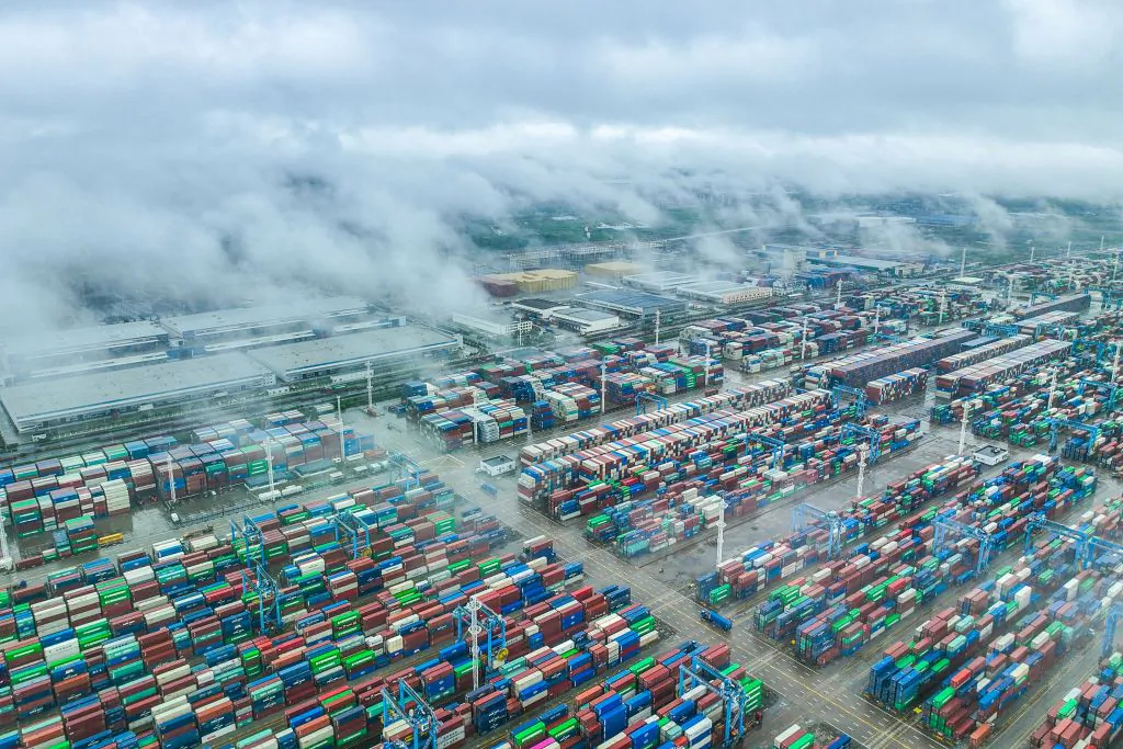 Shipping containers stack at Zhoushan port in Ningbo, in China's eastern Zhejiang province, on April 19, 2023. China's exports just experienced another drop in July, plunging 14.5 percent year-on-year.(STR/AFP via Getty Images)