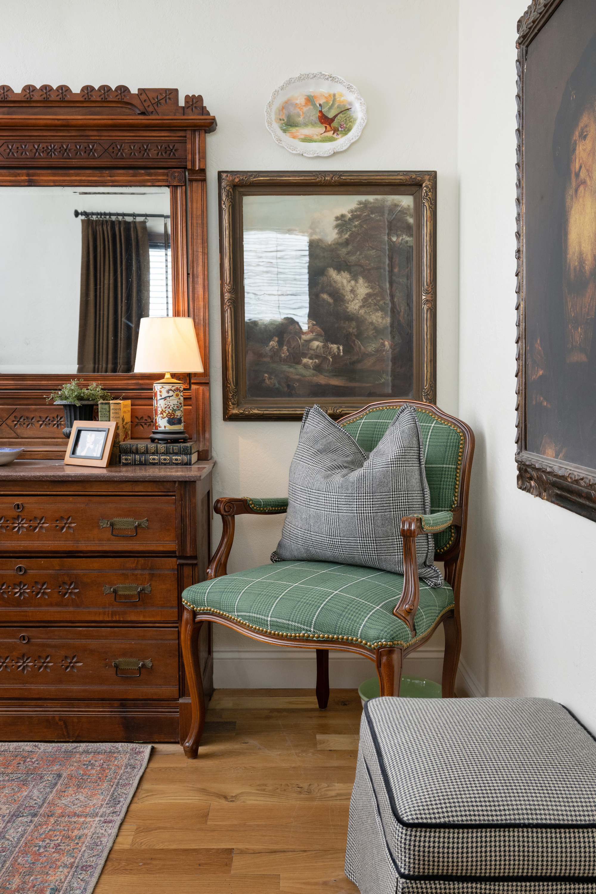 The focal point of the lodge-inspired guest bedroom is the green chair, which Carlie recently had reupholstered with a stunning green Thibaut houndstooth fabric,