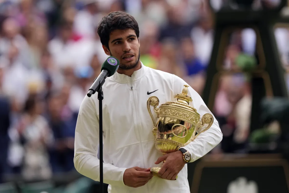 Spain's Carlos Alcaraz speaks after beating Serbia's Novak Djokovic in the men's singles final on day fourteen of the Wimbledon tennis championships in London on July 16, 2023. (Alberto Pezzali/AP Photo)