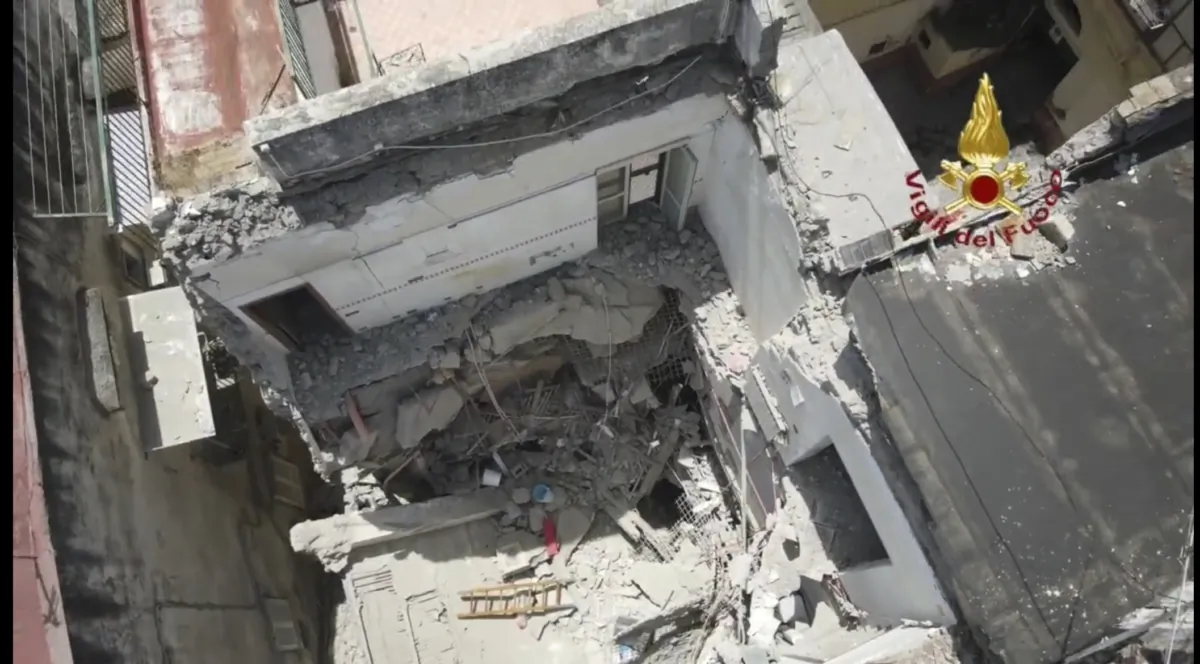 A wing of a three-story apartment building collapsed in Torre Del Greco, a seaside suburb of Naples, in Italy, on July 16, 2023, in a still from video. (Italian Firefighters Via AP)