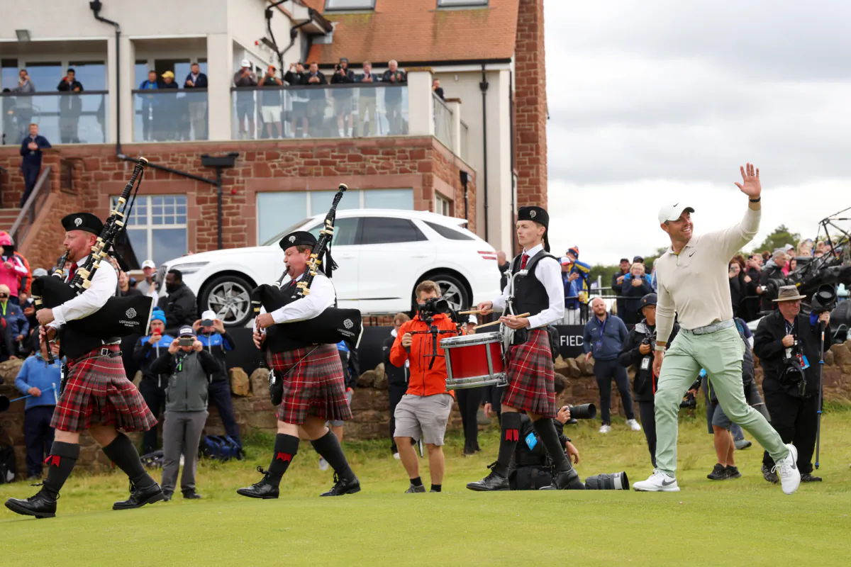Rory McIlroy of Northern Ireland acknowledges the crowd as he walks onto the 18th green for the prize giving ceremony during Day Four of the Genesis Scottish Open at The Renaissance Club in Scotland on on July 16, 2023. (Andrew Redington/Getty Images)