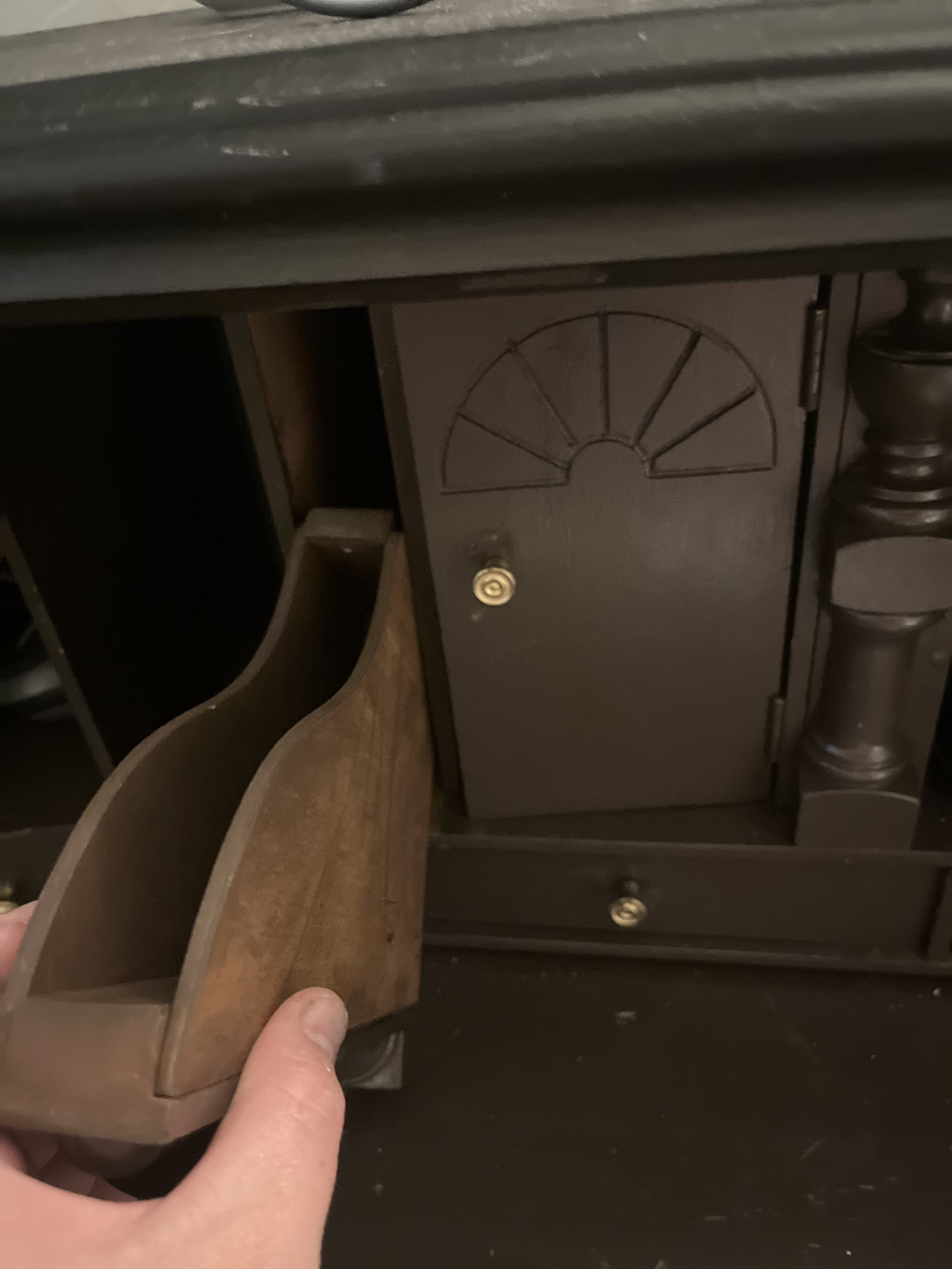 The secret compartment at the secretary desk.
