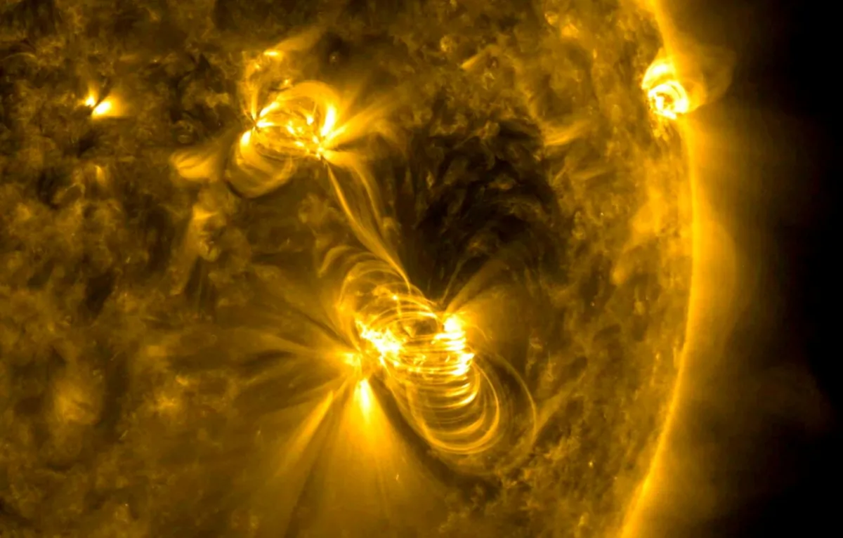 A medium-sized (M2) solar flare and a coronal mass ejection (CME) erupting from the same, large active region of the Sun on July 14, 2017. (NASA/GSFC/Solar Dynamics Observatory/Handout via Reuters)