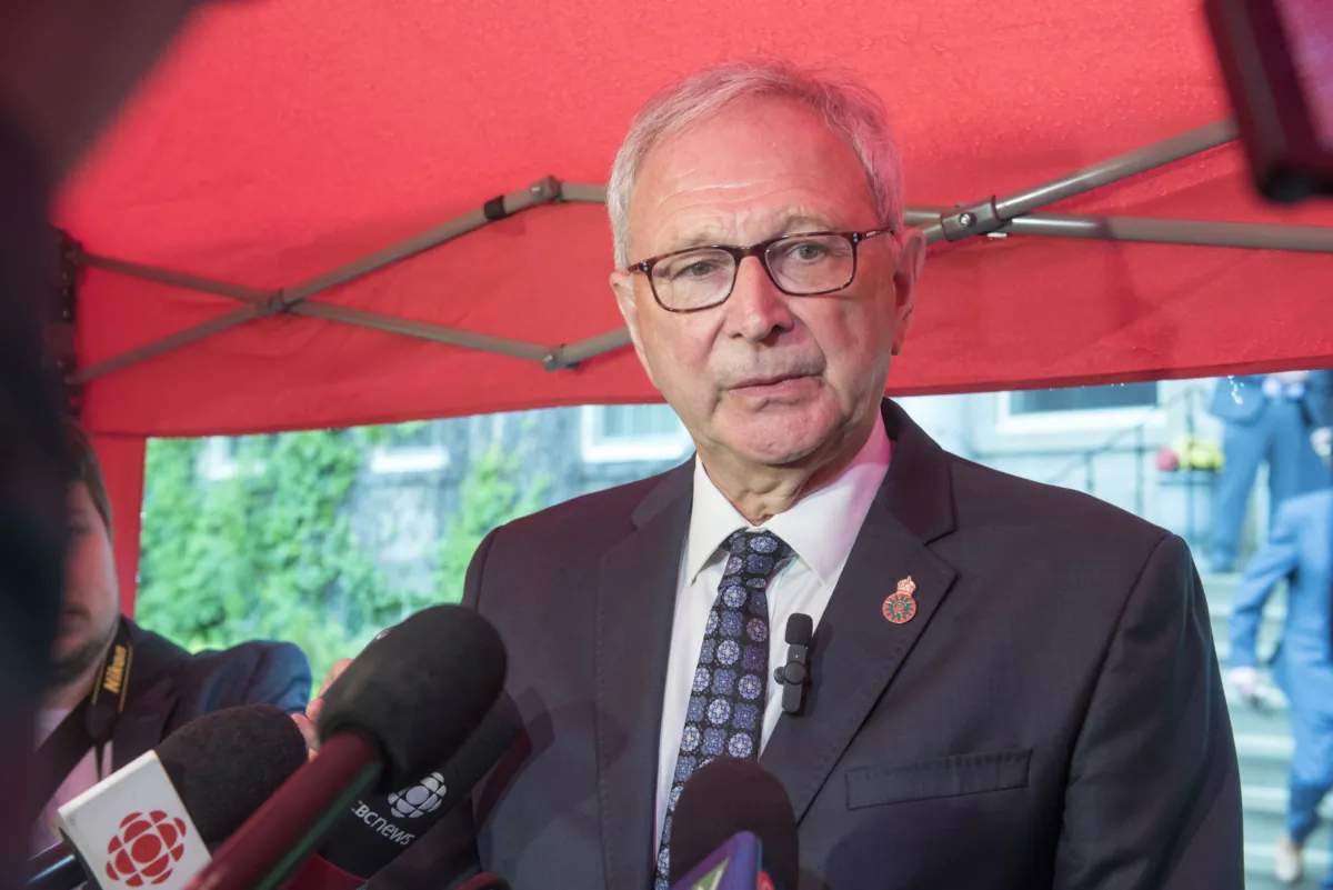 New Brunswick Premier Blaine Higgs speaks to media outside the Government House in Fredericton following a cabinet shuffle on June 27, 2023. (Stephen MacGillivray/The Canadian Press)