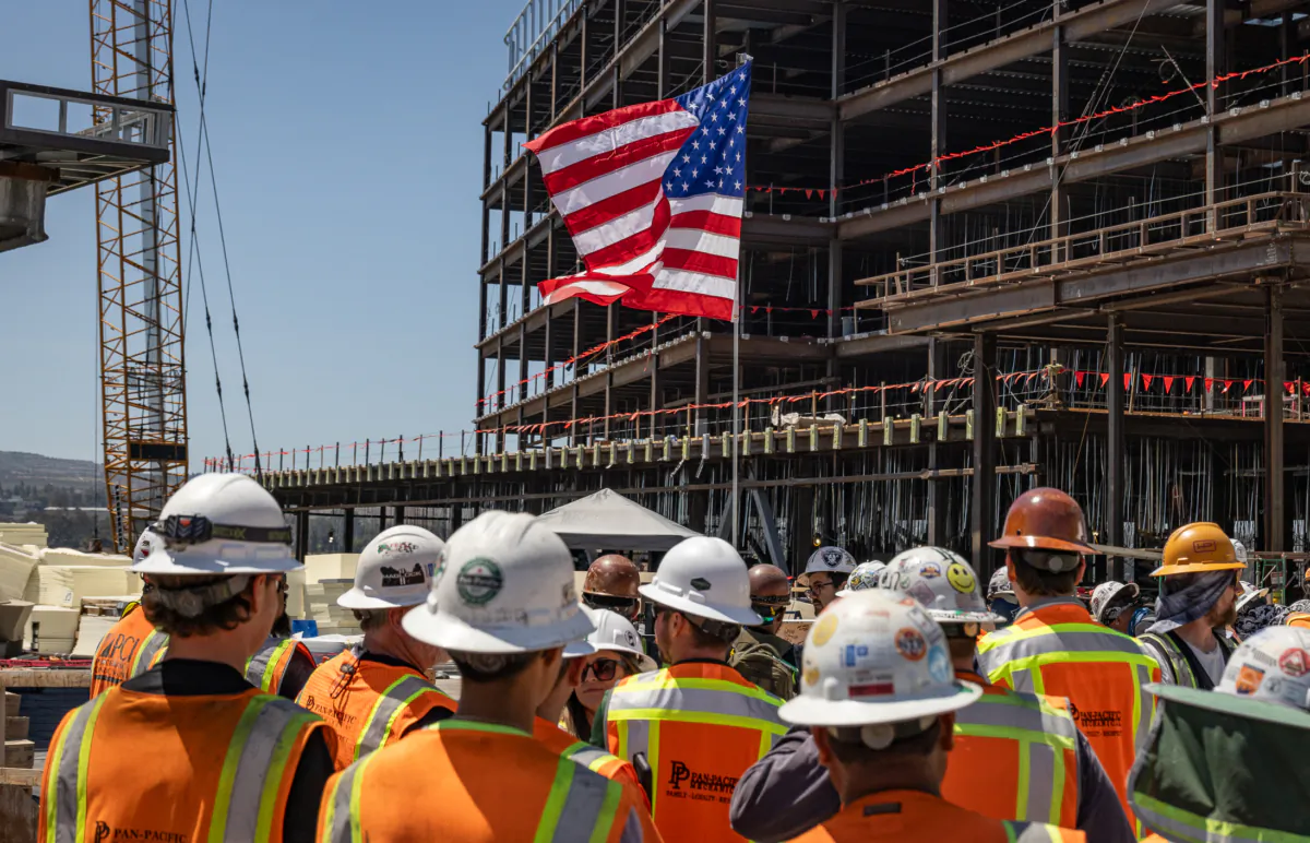 Construction crews work to complete a new medical facility at the University of California–Irvine in Irvine, Calif., on July 13, 2023. (John Fredricks/The Epoch Times)