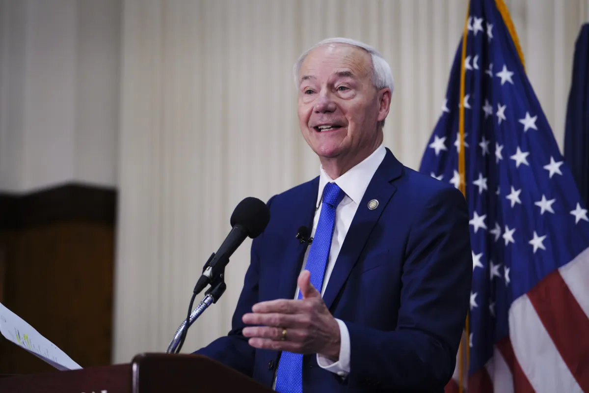 Republican presidential candidate and former Arkansas Gov. Asa Hutchinson announces the first plank of his presidential campaign's policy agenda at the National Press Club in Washington on July 17, 2023. (Madalina Vasiliu/The Epoch Times)
