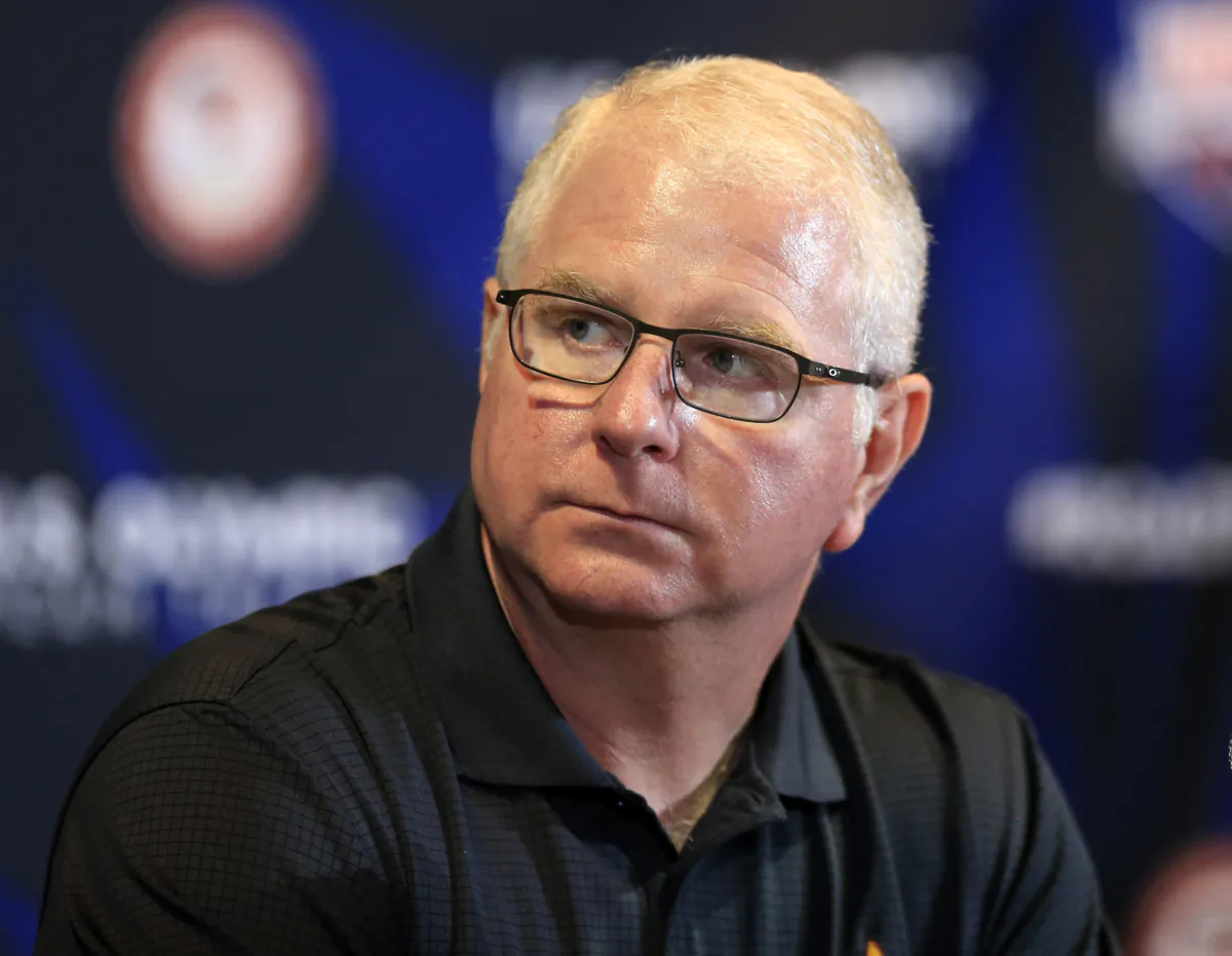 Olympic Team coach Bob Bowman listens to a question during a news conference at the U.S. Olympic team swimming trials in Omaha, Neb., on June 25, 2016. (Orlin Wagner/AP Photo)