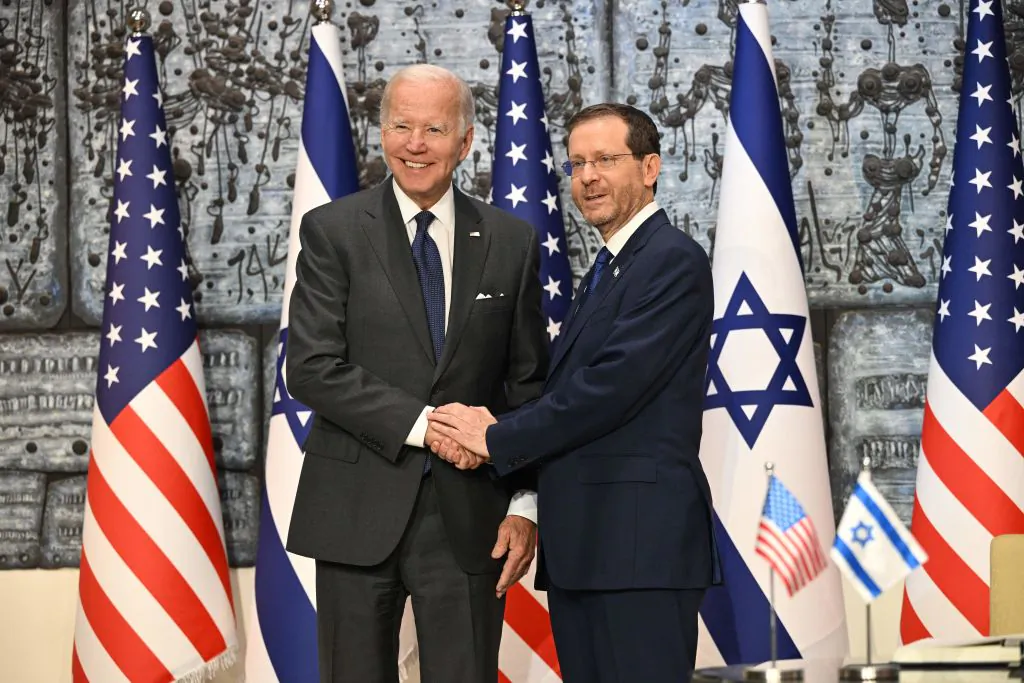 President Joe Biden poses for a photo with Israeli President Isaac Herzog (R) at the presidential residence in Jerusalem on July 14, 2022. (Photo by MANDEL NGAN/AFP via Getty Images)