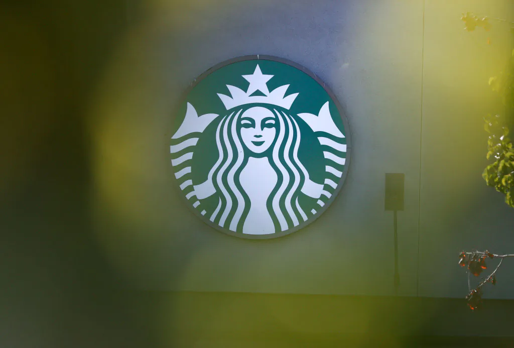 The Starbucks logo is displayed on the exterior of a Starbucks store in San Francisco on Oct. 29, 2021. (Justin Sullivan/Getty Images)