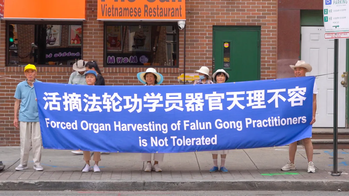 Greater Philadelphia Falun Gong practitioners held a rally in Philadelphia Chinatown on July 15, to call for an end to the Chinese Communist Party’s (CCP) 24-year persecution of Falun Gong. (William Huang/The Epoch Times)