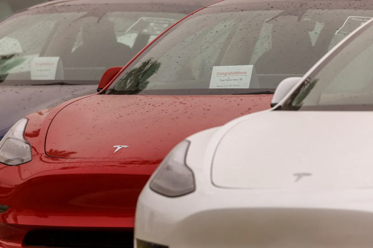 Tesla Model 3 vehicles are shown for sale at a Tesla facility in Long Beach, Calif., on May 22, 2023. (Mike Blake/Reuters)