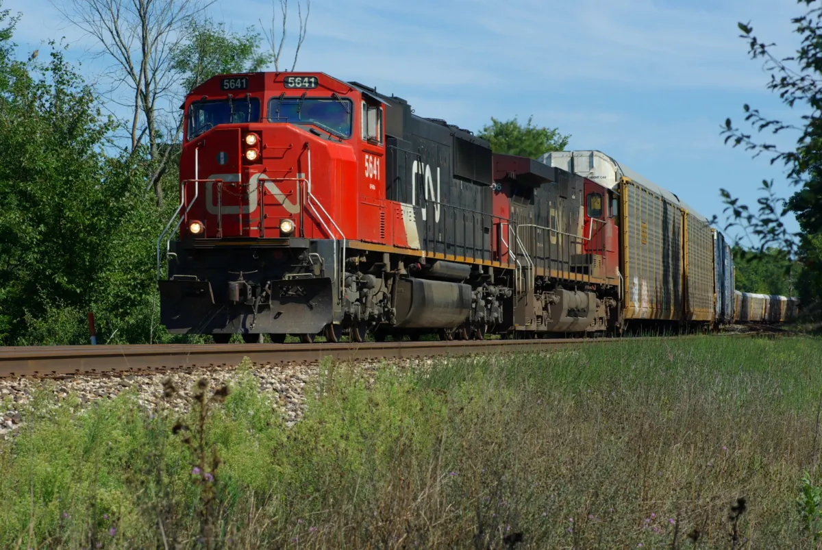 A Canadian National Railway locomotive leads a west bound freight on the old Grand Trunk line to Chicago, in Bellevue, Mich., on Sept. 8, 2007. (Matthew Siddons/Shutterstock)