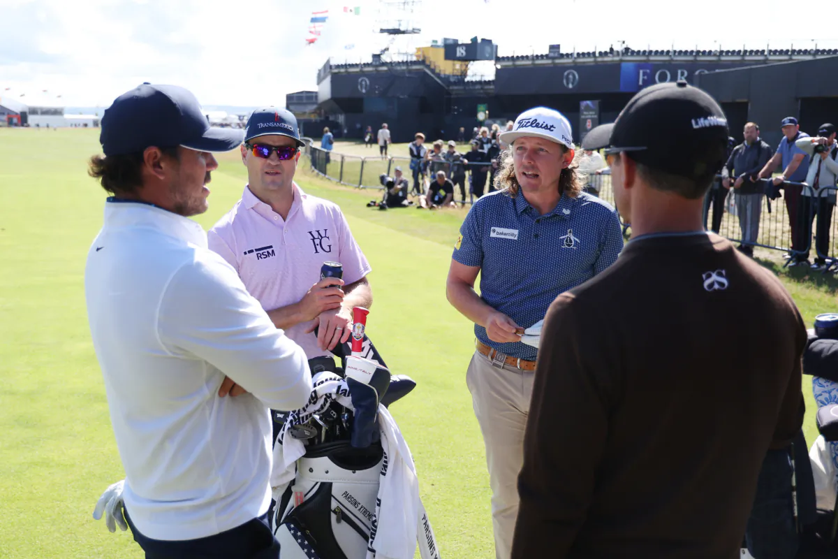 Adam Scott and Cameron Smith of Australia speak with Brooks Koepka and Zach Johnson of United States on the 3rd tee during a practice round prior to The 151st Open at Royal Liverpool Golf Club in Hoylake, England, on July 17, 2023. (Gregory Shamus/Getty Images)
