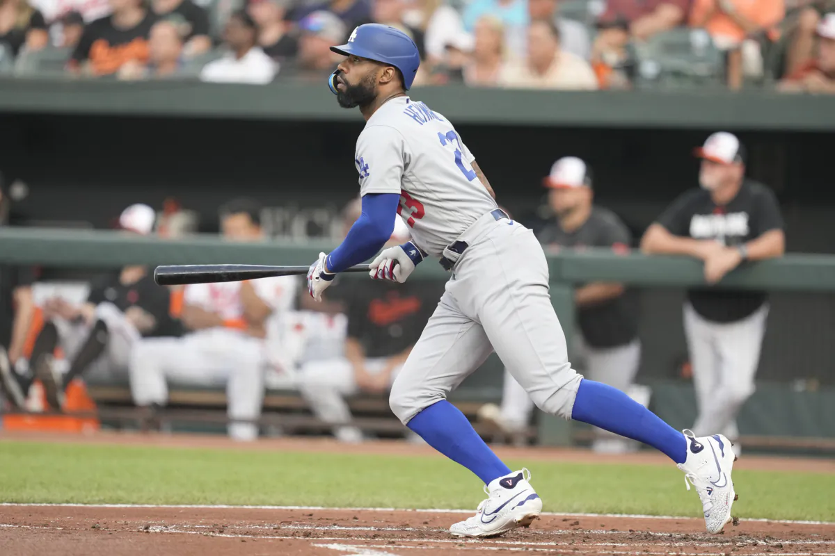 Jason Heyward (23) of the Los Angeles Dodgers hits a three-run home run in the second inning against the Baltimore Orioles at Oriole Park at Camden Yards in Baltimore on July 18, 2023. (Mitchell Layton/Getty Images)