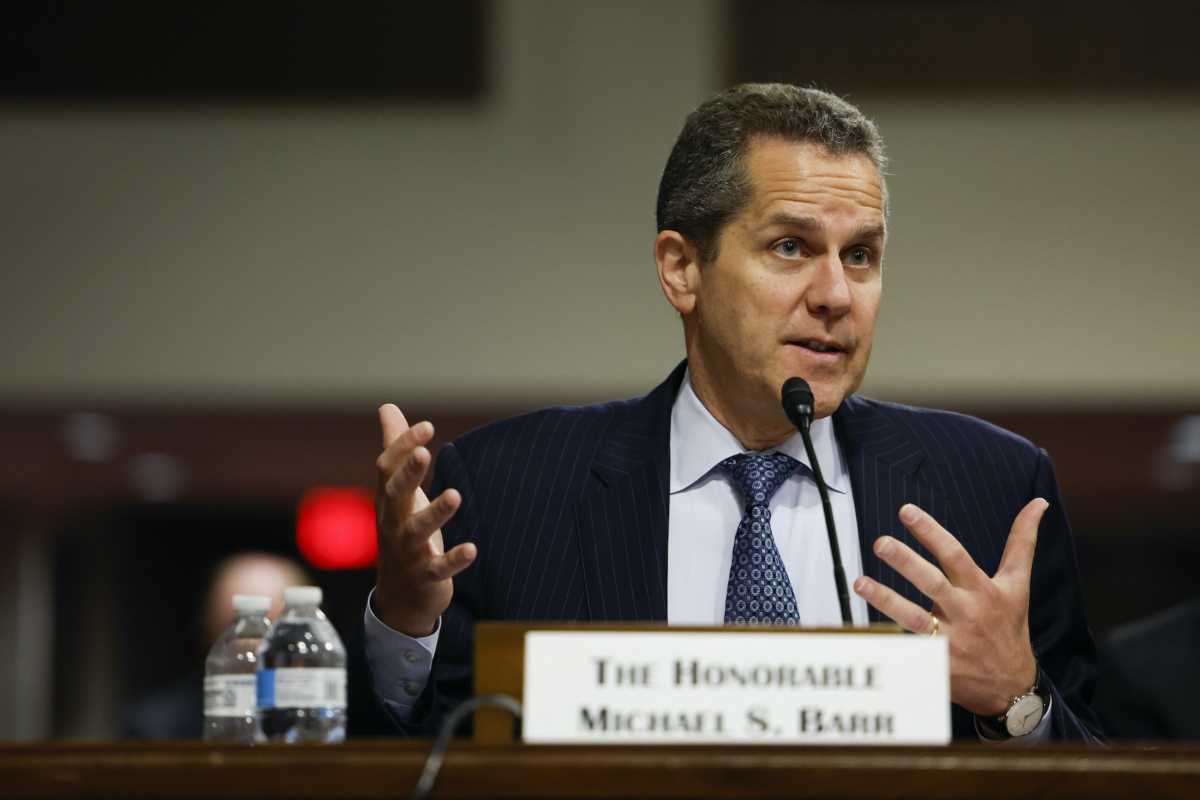 NextImg:Top Fed Regulator Cautions AI Risks Violating Lending Laws