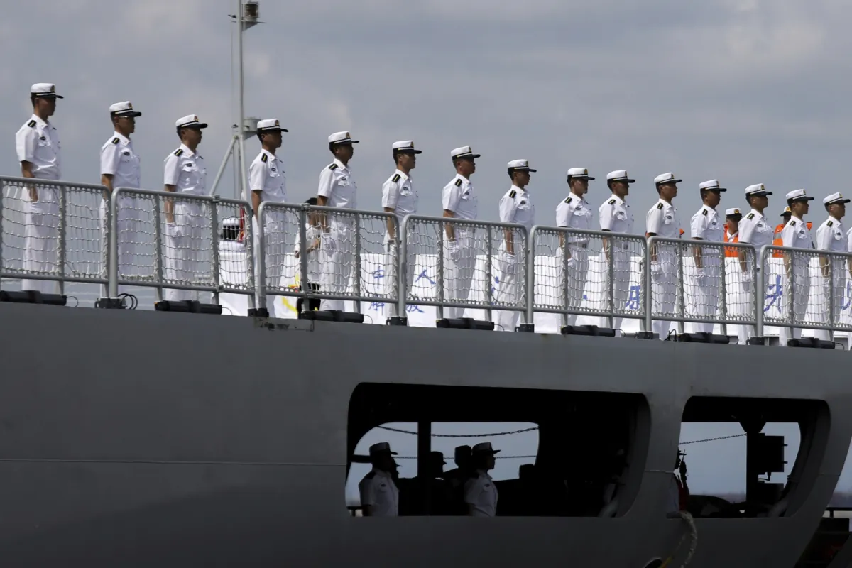 Chinese navy sailors stand in formation on board the naval training ship Qi Jiguang as it docks at Manila's port in Philippines on June 14, 2023. (Basilio Sepe/AP Photo)