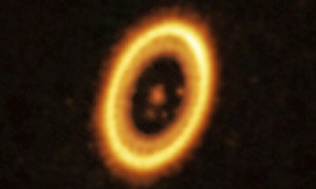The young planetary system PDS 70, located nearly 400 light-years away from Earth. (European Southern Observatory via AP)