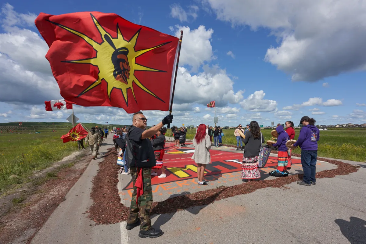 Activists blockade the main road into the Brady Road landfill, just outside of Winnipeg, July 10, 2023. (David Lipnowski/The Canadian Press)