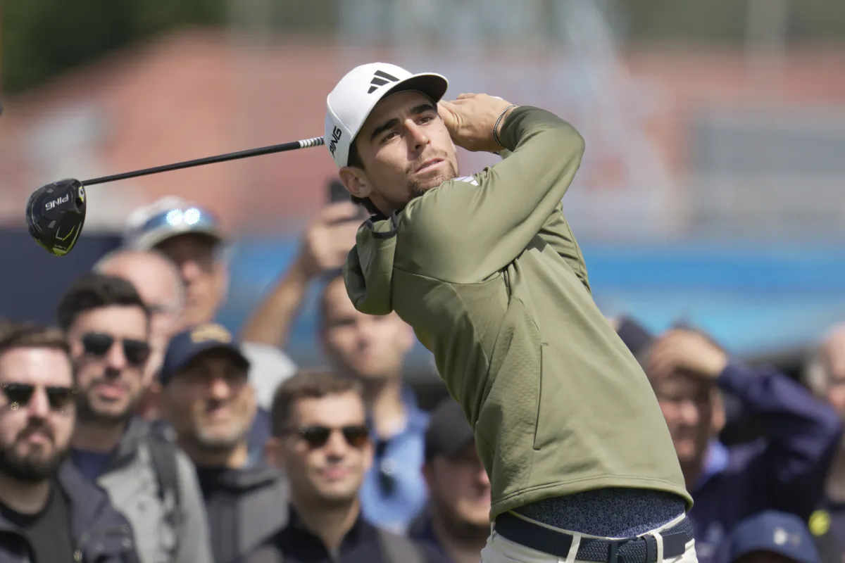 Chile's Joaquin Niemann plays his tee shot on the 12th hole during a practice round for the British Open Golf Championships at the Royal Liverpool Golf Club in Hoylake, England, on July 19, 2023. (Kin Cheung/AP Photo)