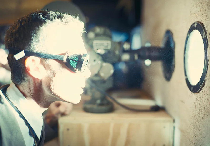 J.R. Oppenheimer (Cillian Murphy) views the atomic explosion, in “Oppenheimer.” (Universal Pictures)