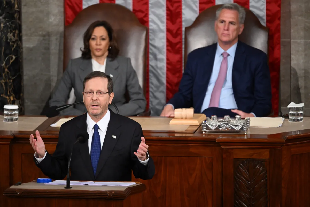Vice President Kamala Harris and House Speaker Kevin McCarthy (R-Calif.) look on as Israeli President Isaac Herzog addresses a Joint Meeting of Congress in the House Chamber of the U.S. Capitol in Washington on July 19, 2023. (Saul Loeb/AFP via Getty Images)