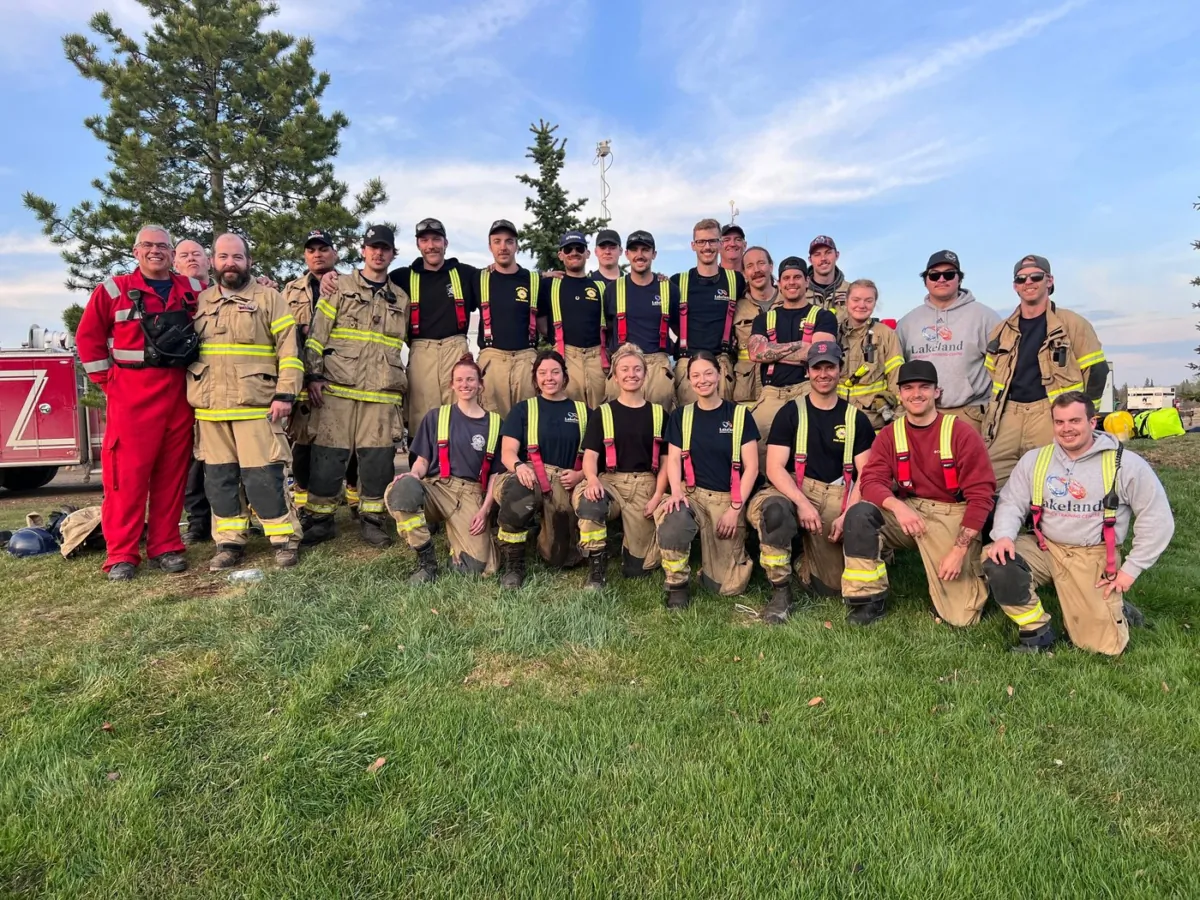 Lakeland College firefighter training students and staff pose in this undated handout photo. (The Canadian Press/HO, Lakeland College)
