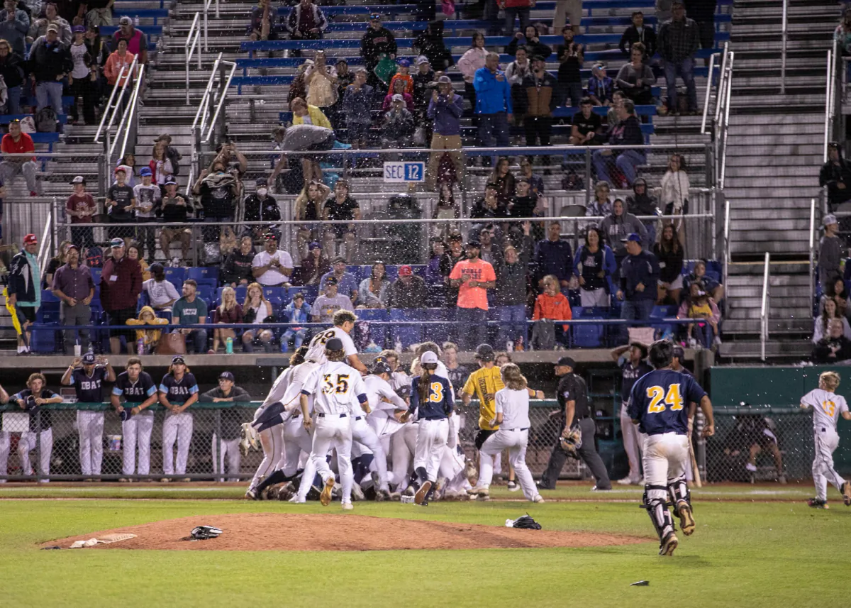 Midland, Ohio, Redskins are celebrating after winning the Connie Mack World Series championship over Dallas-based D-BAT United in 2022. (W. Dean Howard/Visualink Graphics)