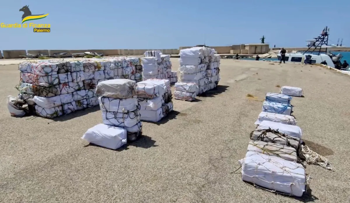 Packages containing cocaine seized during a police operation, lie on a dock in the harbour of Porto Empedocle, Italy, on July 21, 2023. (Guardia di Finanza/Handout via Reuters)
