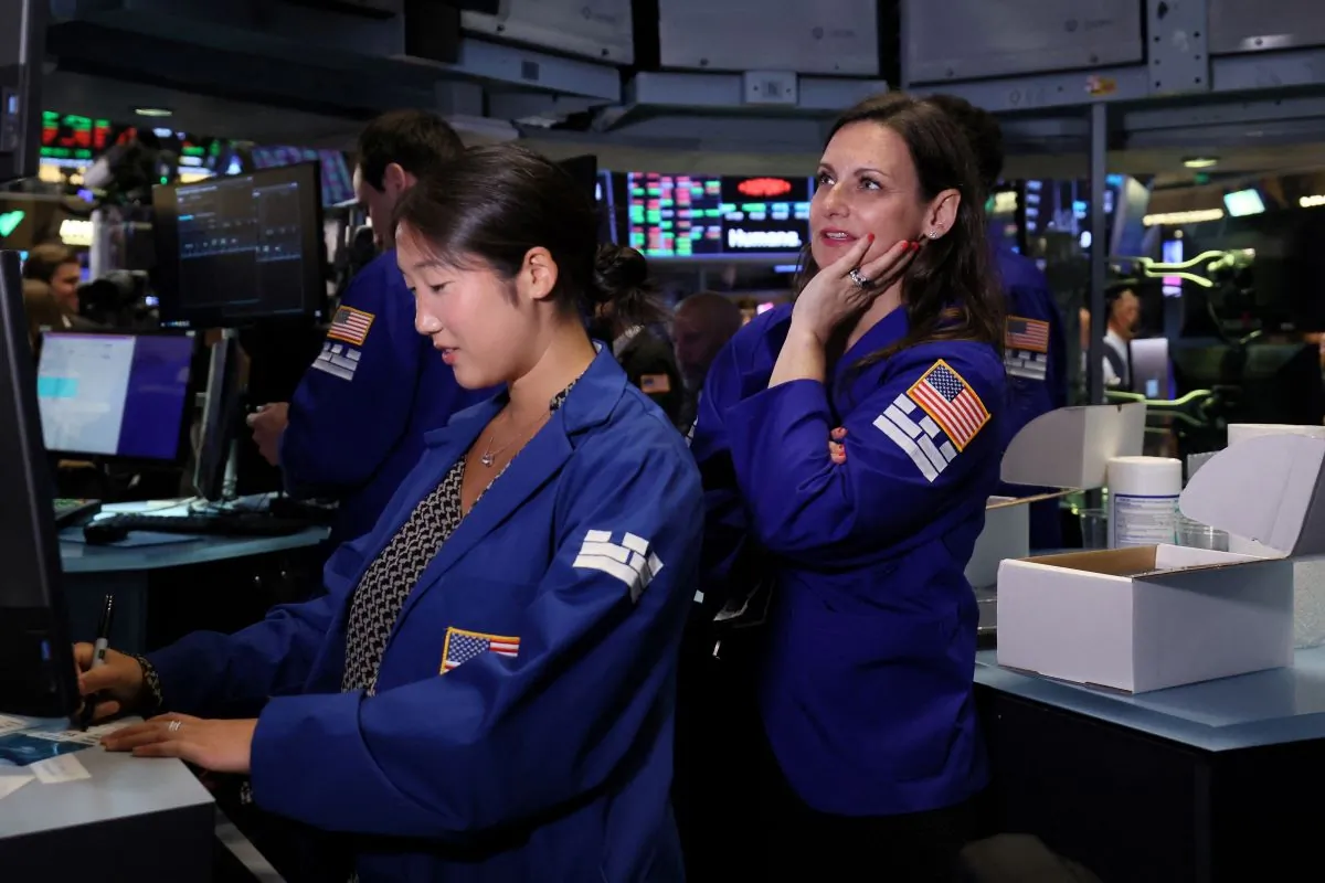 Traders work on the floor of the New York Stock Exchange (NYSE) in New York City on July 20, 2023. (Brendan McDermid/Reuters)